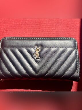 Luxury-inspired wallet with 2 zippered compartments. NWOT!